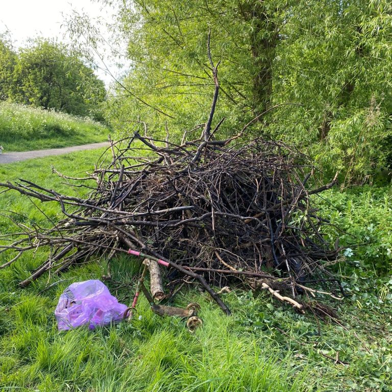 A large quantity of debris removed from the river by Hunter Street Bridge.